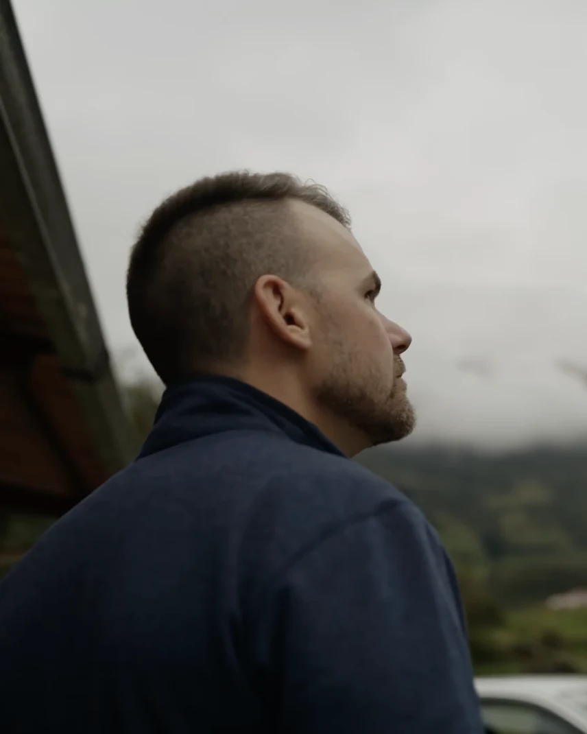 John Darnell looks out over a misty valley in Ecuador in a scene from the documentary Beyond River’s Edge